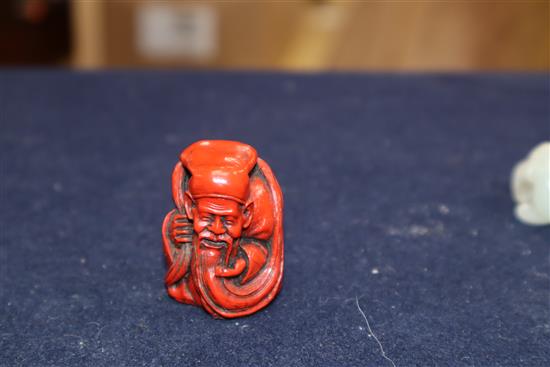 A Chinese carved jade group of two kylin, red lacquered and carved figure of a sage tallest 7cm